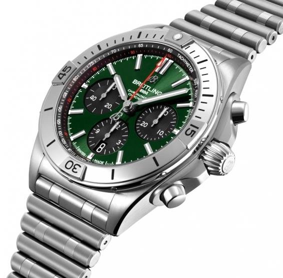 The stainless steel fake watch has a green dial.